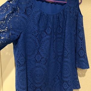 Beautiful blue blouse with lined bodice peep shoulders.